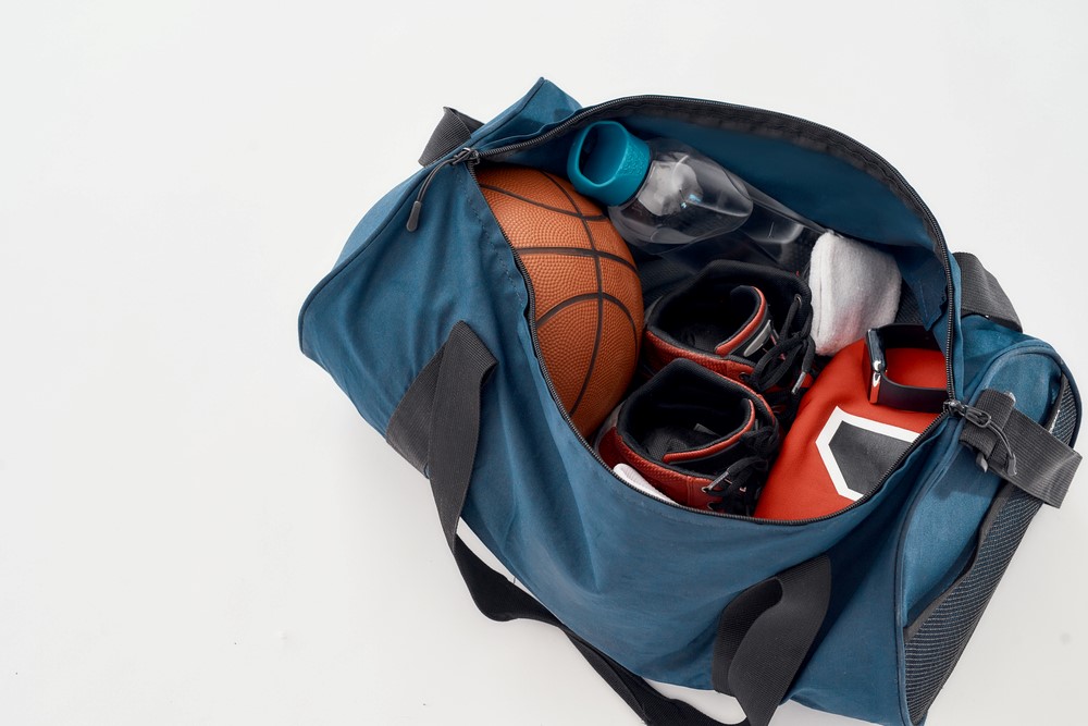 Duffel bag with basketball equipment